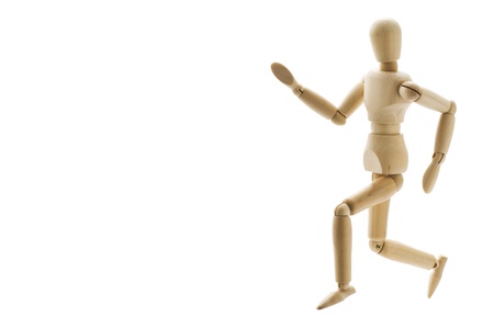 Wooden pose puppet isolated on white background の写真素材