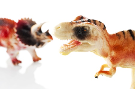 Dinosaur toy on white background, close-up の写真素材