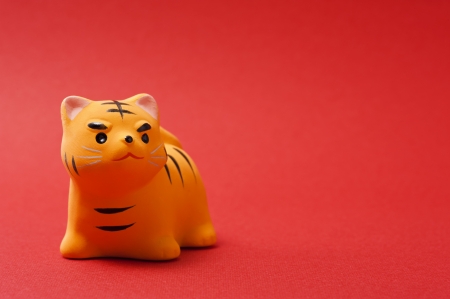 tiger, japanese new year image on red background の写真素材