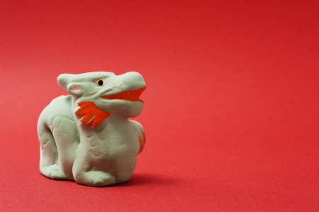 dragon, japanese new year image on red background の写真素材