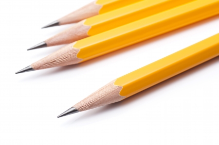 wooden orange pencils on white background, close-upの写真素材
