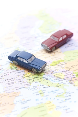 miniature toy car on world map backgroundの写真素材