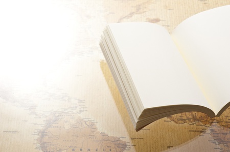 open blank book on world map backgroundの写真素材