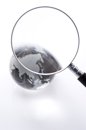 magnifying glass with glass glove on white backgroundの写真素材