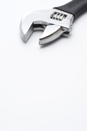 close-up of monkey wrench on white backgroundの写真素材