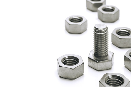 metal bolt and nut on white backgroundの写真素材