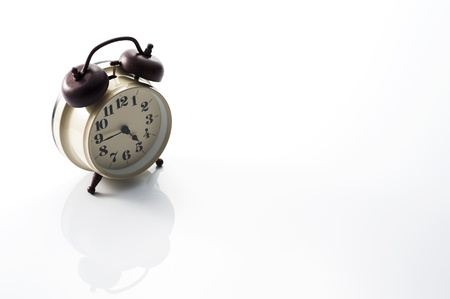 Alarm clock on white background