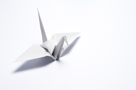 origami crane on white backgroundの写真素材