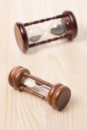 hourglass on wooden tableの写真素材