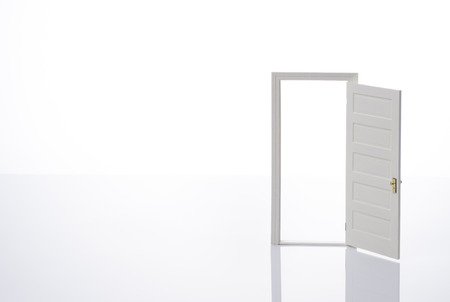 Opened door on white background