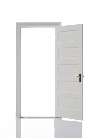 Opened door on white backgroundの写真素材