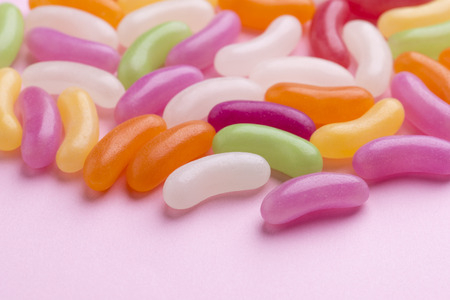 jelly bean on pink backgroundの写真素材