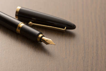 fountain pen on tableの写真素材