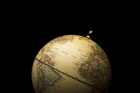 Vintage Globe on black の写真素材