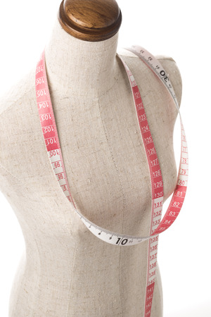 mannequin with a tape measure, close-upの写真素材