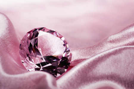 Jewel on satin fabric backgroundの写真素材