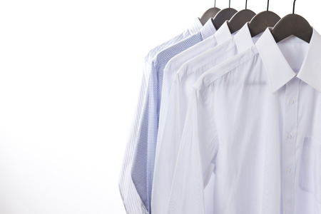 shirt and hanger hang on a paulの写真素材