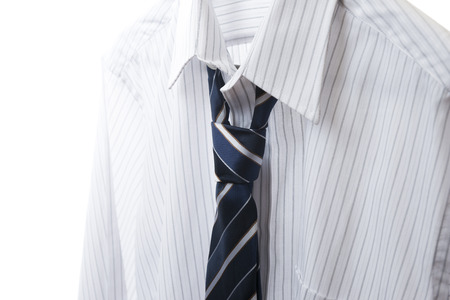 White shirt and striped tie, close upの写真素材
