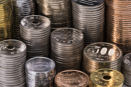 Stacked Japan of coins