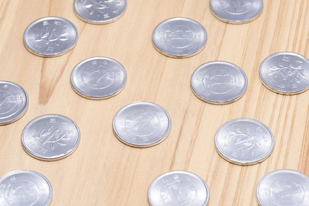 one yen on wooden tableの写真素材