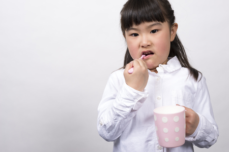 Girl brush your teethの写真素材