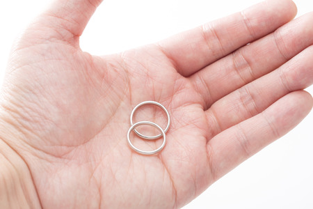 Wedding ring on the handsの写真素材