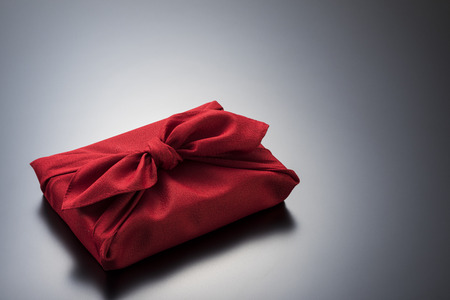 Furoshiki is Japanese wrapping cloth, traditionally used to transport gifts.の写真素材