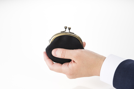 Male hand with walletの写真素材