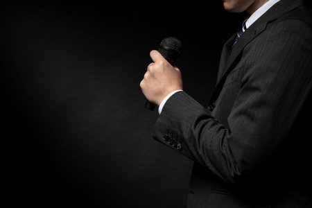 Man who speaks with a microphoneの写真素材
