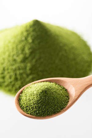 Green juice powder, dissolve in water and drink  Healthy food.の写真素材