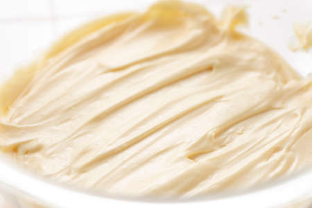 Mix homemade mayonnaise in a bowl.
