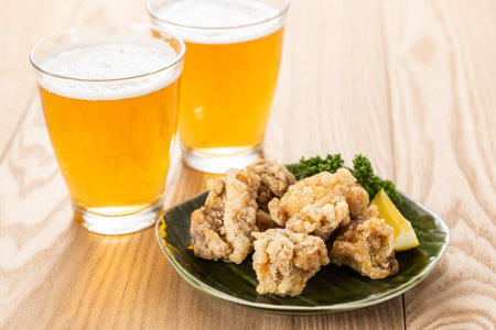 Fried chicken and non-alcoholic beer.の写真素材