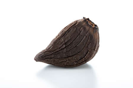 Black garlic, health food made by fermenting garlic.の写真素材