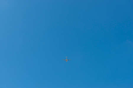 Airliner taking off in the blue sky.