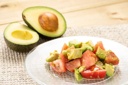 Served avocado and tomato salad