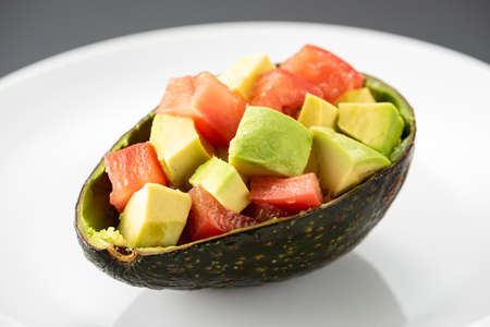 Served avocado and tomato salad