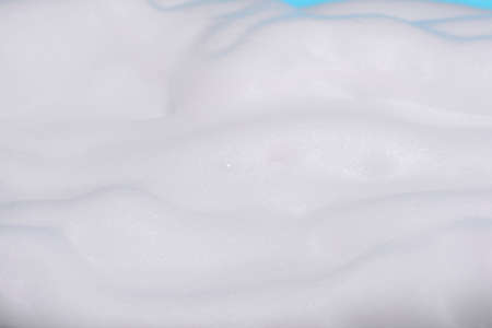 Bubbles background. Soap foam and facial cleansing foam.