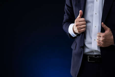 Businessman gesturing, Close up of male hand.の写真素材