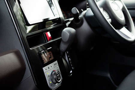 Car interior. Handle, lever, switch, car navigation system.