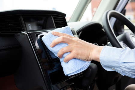 Clean the inside of the car with a cloth.の写真素材