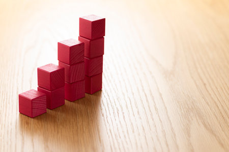Blocks stacked on wood table.