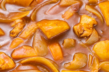 Curry and rice making, cooking.