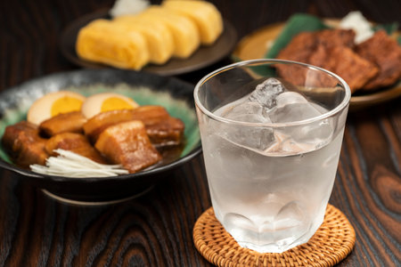 Cuisine and drinks in Japanese bar restaurant. Shochu on the rock.の写真素材
