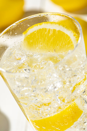 Highball Laced With Lemon juice Flavour.
Fresh white plank background.の写真素材