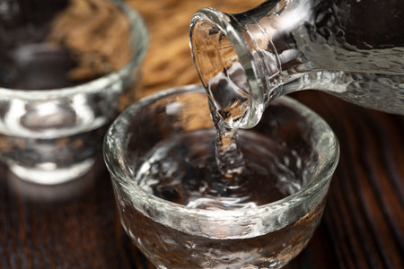 Cold sake on the table in the restaurantの写真素材