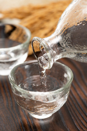 Cold sake on the table in the restaurantの写真素材