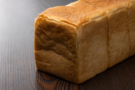 A loaf of bread on the tableの写真素材