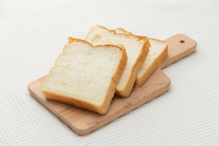 Sliced bread on the breakfast tableの写真素材