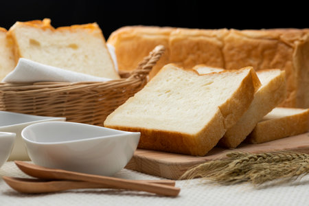Bread and jam on the tableの写真素材