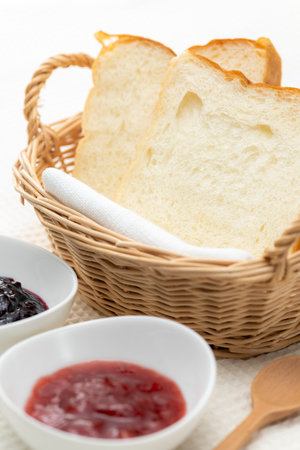 Bread and jam on the tableの写真素材